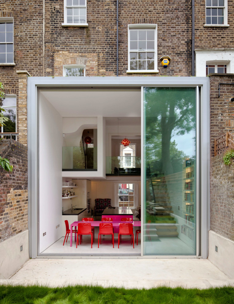 Design ideas for a rear extension in London with a flat roof.