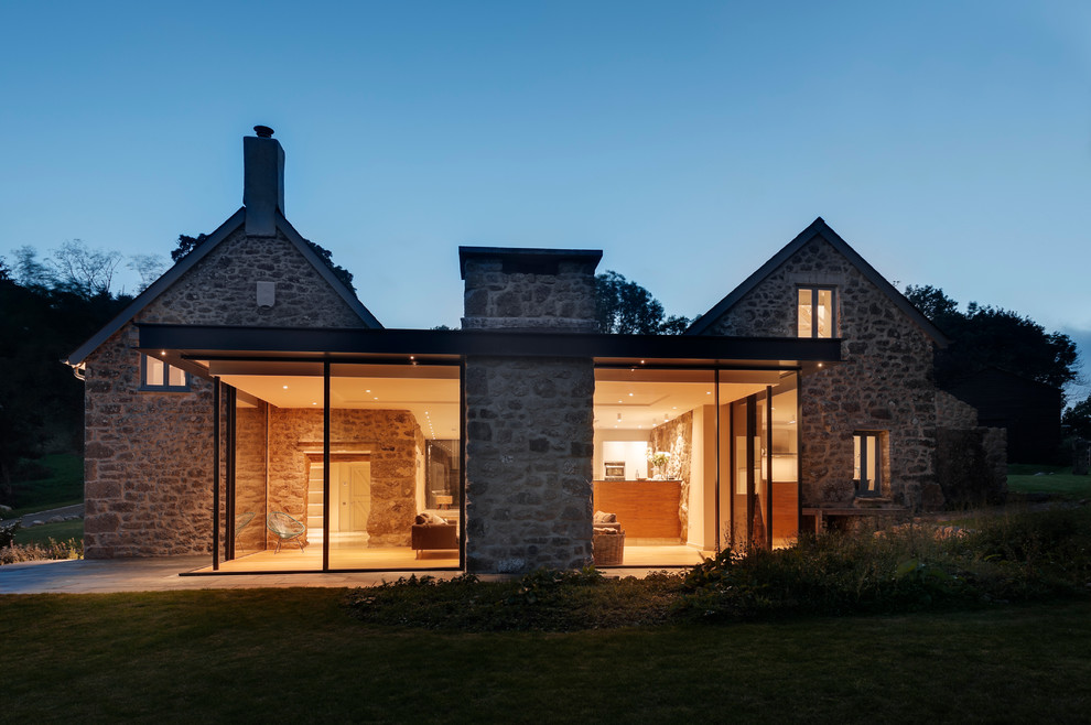 Large farmhouse exterior home idea in Devon
