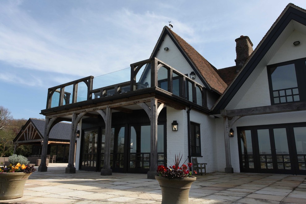 Design ideas for a large coastal house exterior in Sussex.