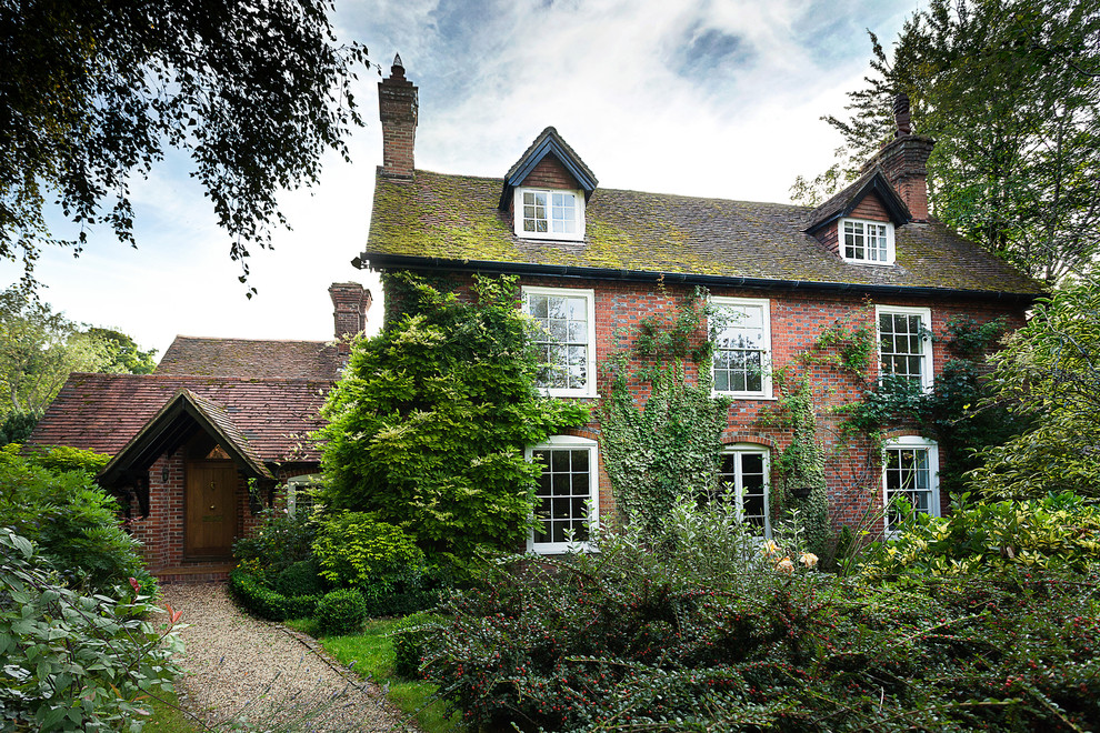 Photo of a medium sized classic two floor brick house exterior in Hampshire.