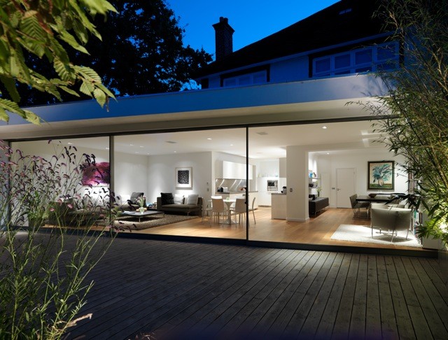 Photo of a contemporary bungalow extension in London.