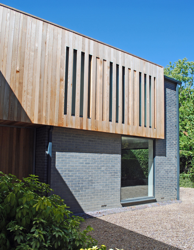 Design ideas for a contemporary house exterior in Hampshire.