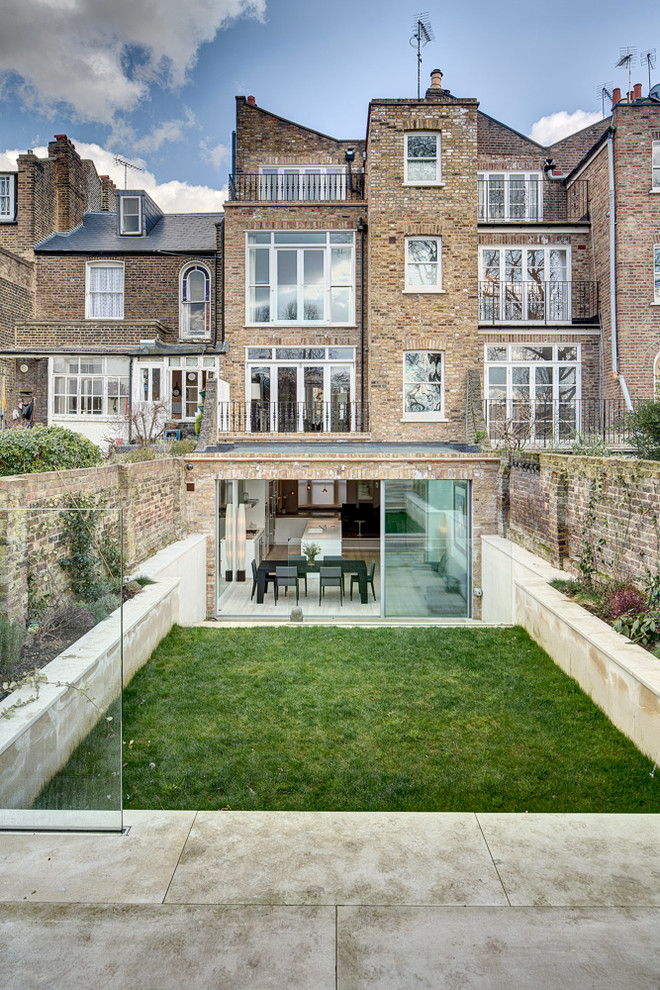 Contemporary rear house exterior in London with four floors.
