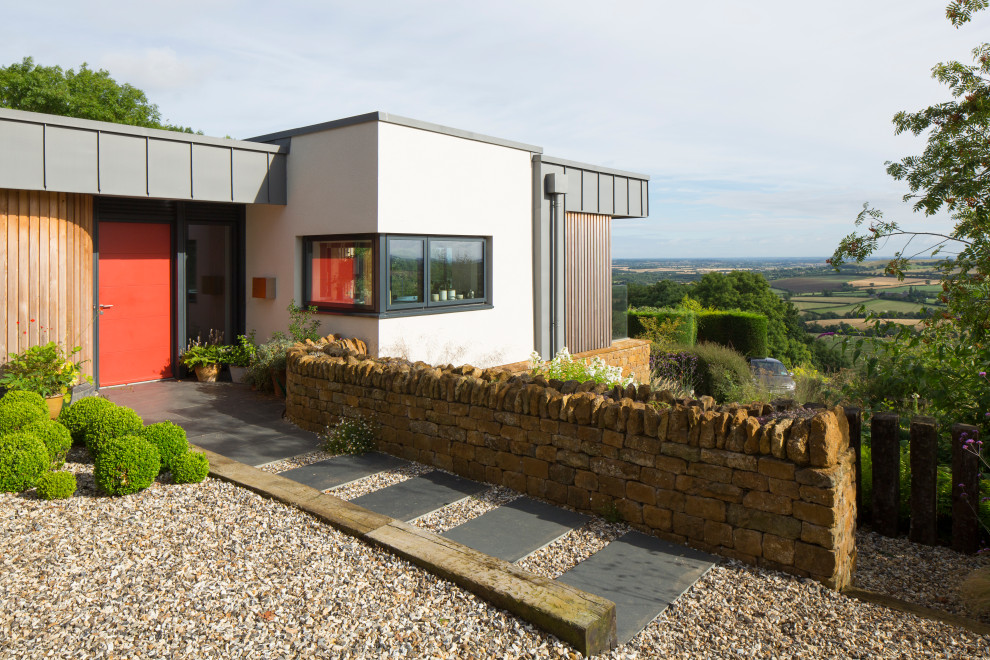 Zweistöckiges Modernes Einfamilienhaus mit Putzfassade und Flachdach in West Midlands