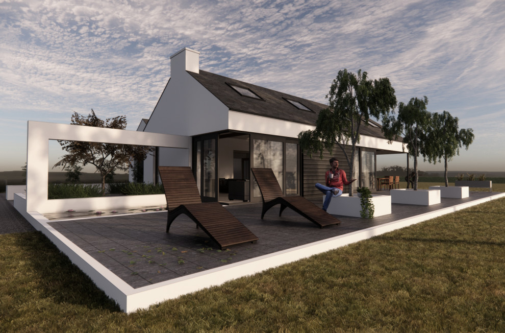 Idée de décoration pour une façade de maison blanche design en stuc de taille moyenne et de plain-pied avec un toit à deux pans et un toit en tuile.