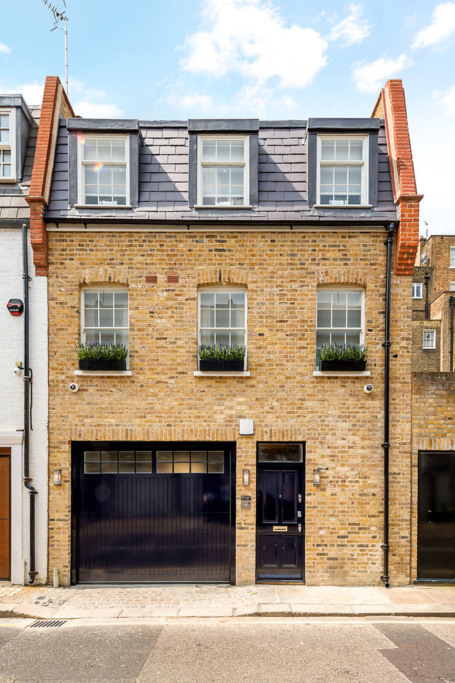 This is an example of a traditional brick terraced house in Other with three floors, a hip roof and a shingle roof.