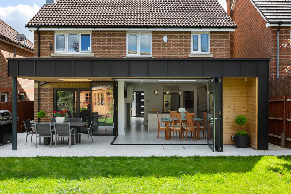 Medium sized contemporary two floor detached house in Hertfordshire with mixed cladding.