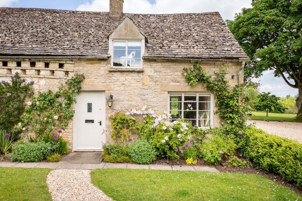 This is an example of a medium sized rural house exterior in Gloucestershire.