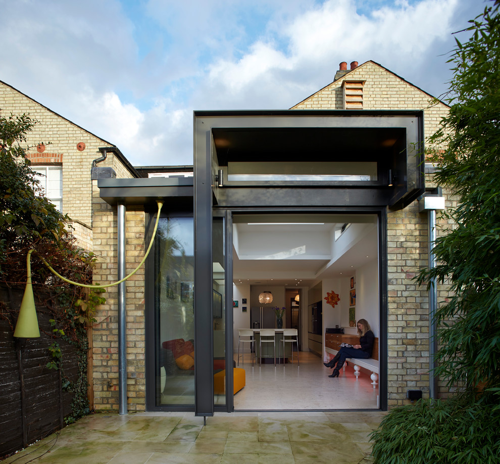 Inspiration for a contemporary brick house exterior in Cambridgeshire.