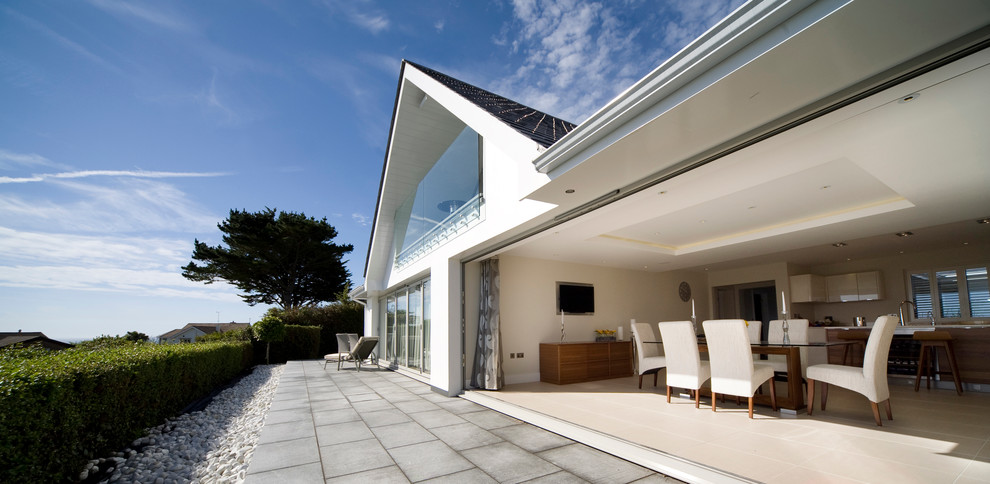 Design ideas for a modern house exterior in Channel Islands.