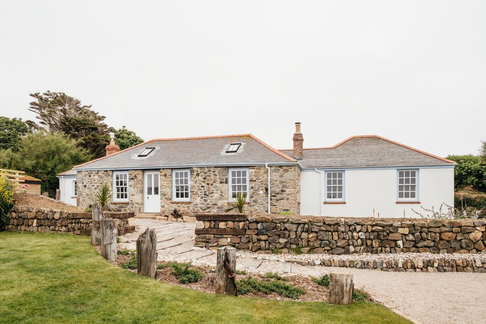 Example of a beach style exterior home design in Cornwall