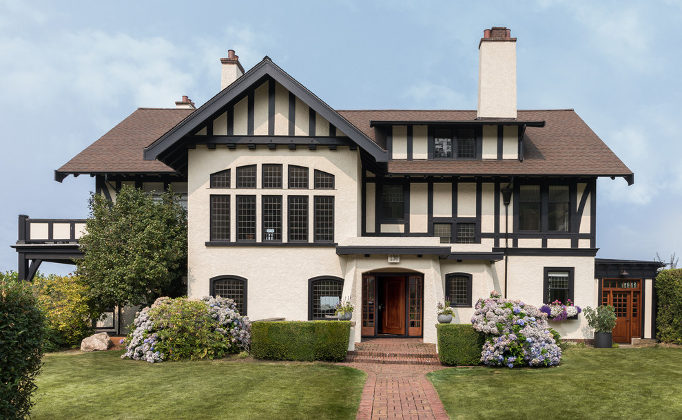 Inspiration for a mid-sized craftsman multicolored two-story exterior home remodel in Seattle with a shingle roof