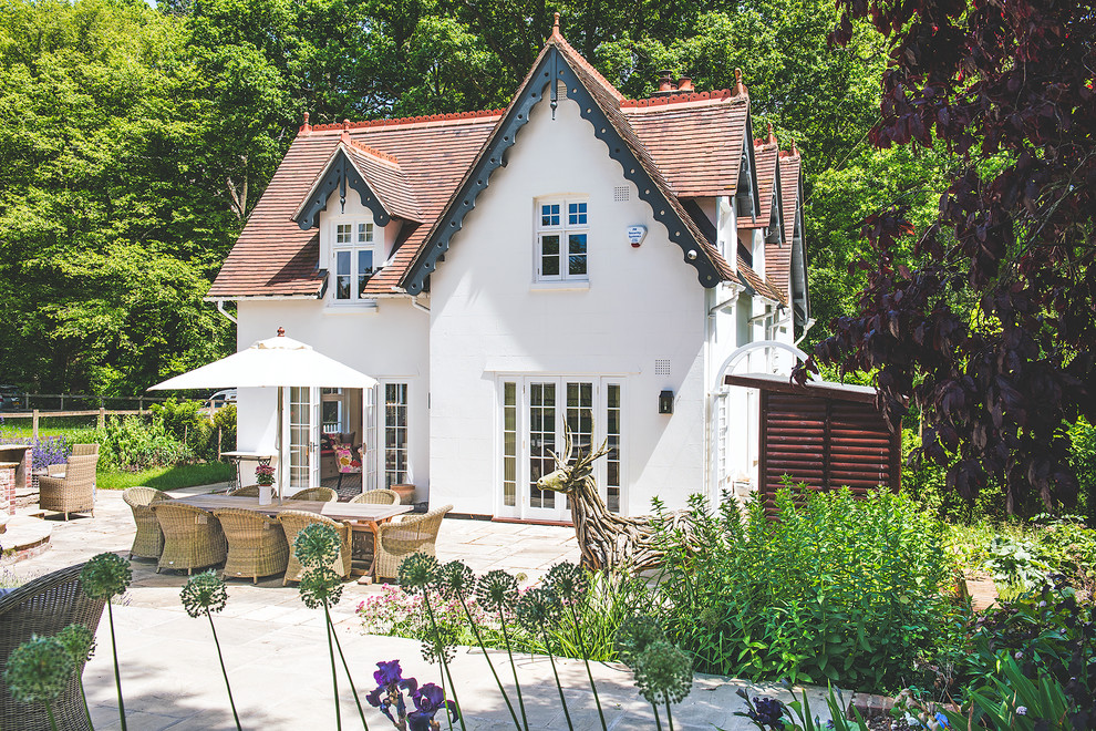 Inspiration for a small and white classic two floor render house exterior in Berkshire with a pitched roof.