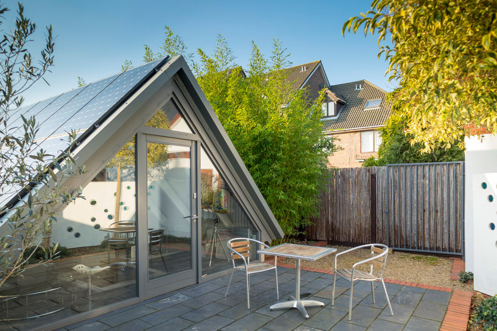 Inspiration for a contemporary bungalow house exterior in Hampshire with a pitched roof.