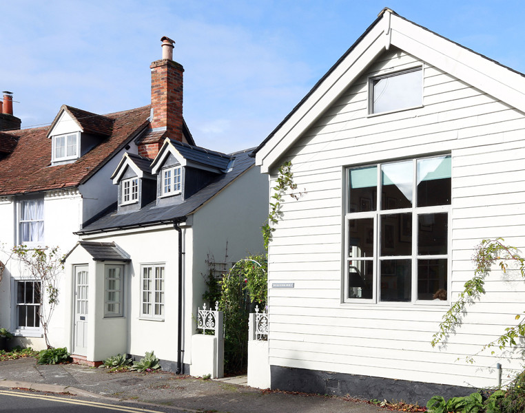Example of an eclectic exterior home design in London