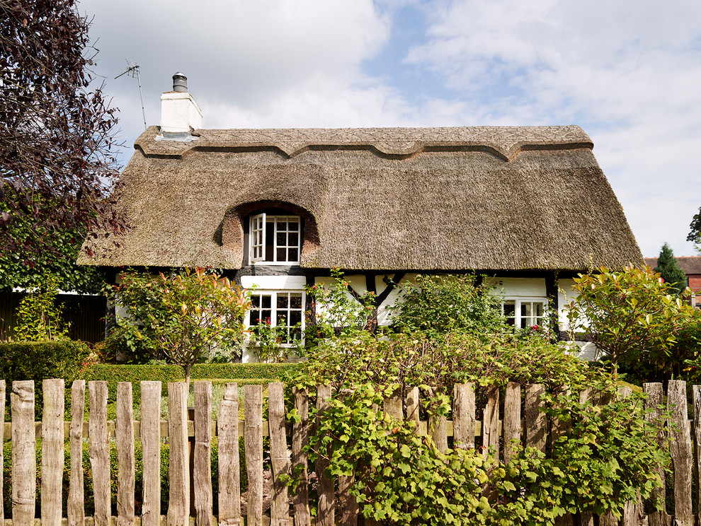 Design ideas for a white classic two floor house exterior in Cheshire.