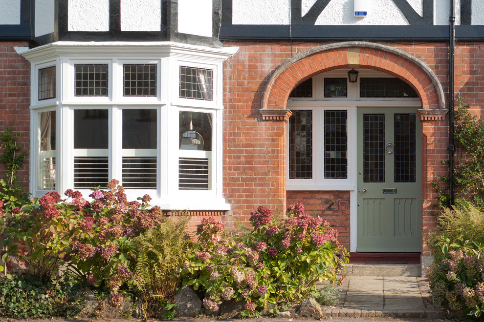 Design ideas for a classic house exterior in Sussex.