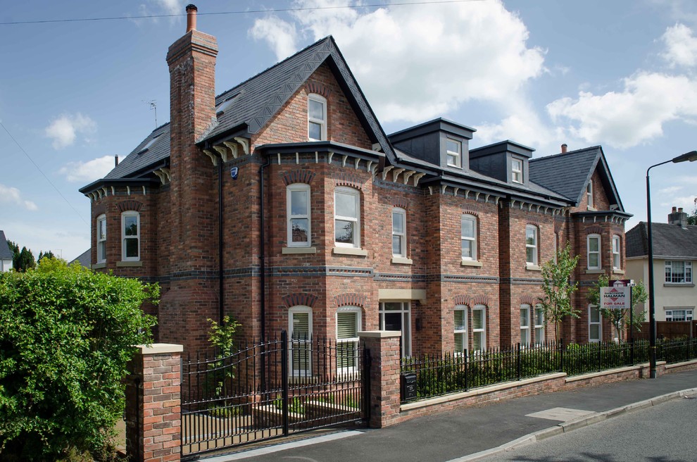 This is an example of a victorian house exterior in Cheshire with three floors.