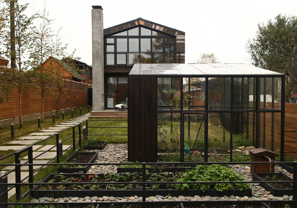 Design ideas for a small contemporary greenhouse in Moscow.