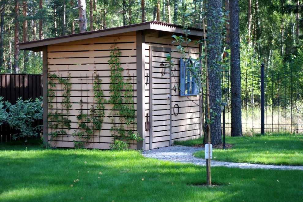 Example of a trendy detached garden shed design in Saint Petersburg