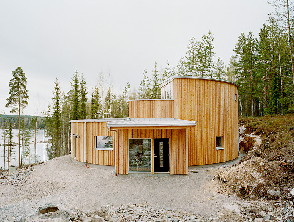 Идея дизайна: одноэтажный, деревянный дом среднего размера в современном стиле