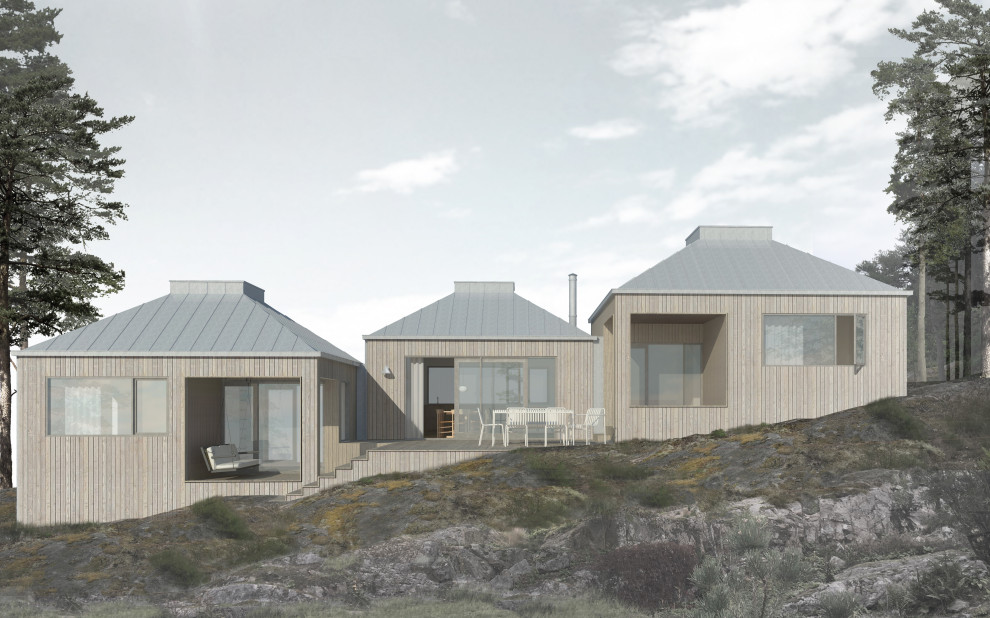 Idées déco pour une façade de maison grise scandinave en bois de taille moyenne et de plain-pied avec un toit en métal.