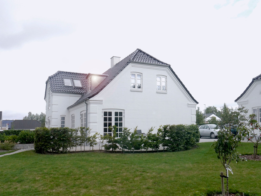 Cette image montre une façade de petite villa nordique.