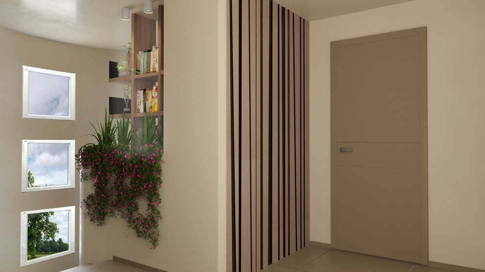 Cette image montre une petite entrée minimaliste avec un vestiaire, un sol en carrelage de porcelaine et une porte simple.