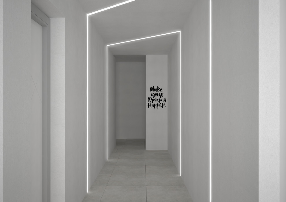 Bild på en mellanstor minimalistisk hall, med vita väggar, klinkergolv i porslin och vitt golv