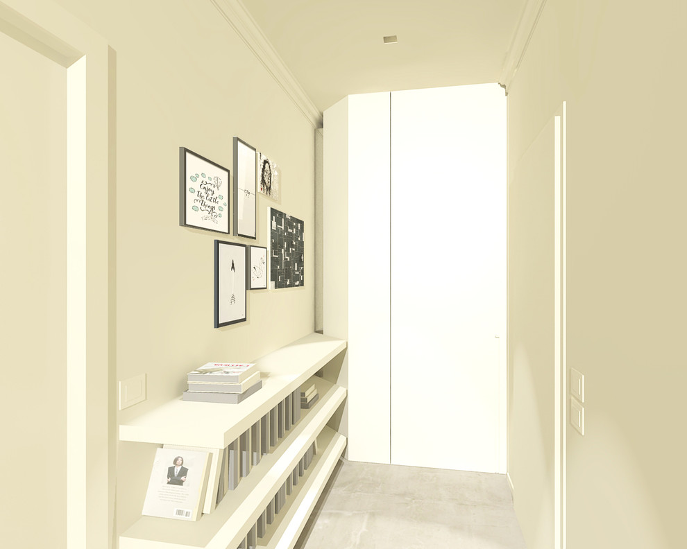 Foto de distribuidor contemporáneo pequeño con paredes blancas, suelo laminado, puerta simple y puerta blanca