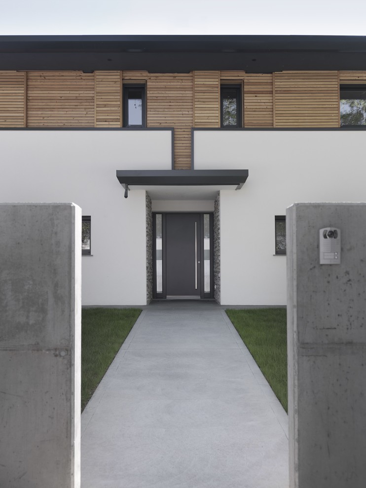 Mittelgroße Moderne Haustür mit weißer Wandfarbe, Einzeltür und grauer Haustür in Sonstige