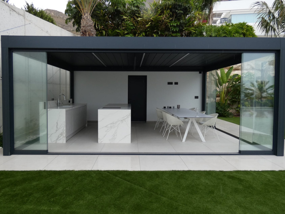 Inspiration for a medium sized contemporary courtyard driveway partial sun garden for summer in Alicante-Costa Blanca with a garden path and concrete paving.