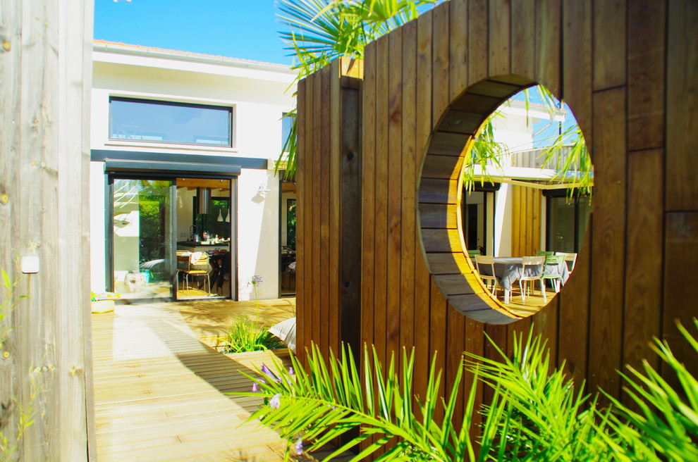 Idee per un piccolo privacy in giardino stile marino esposto in pieno sole davanti casa con pedane