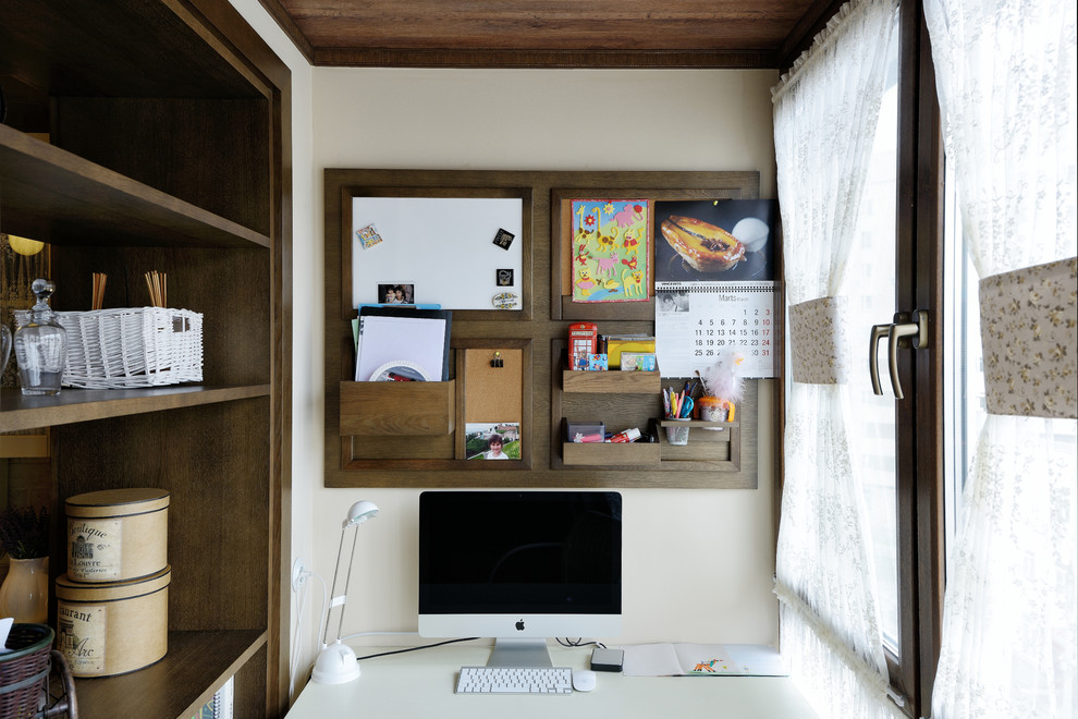 Inspiration for a transitional freestanding desk study room remodel in Other