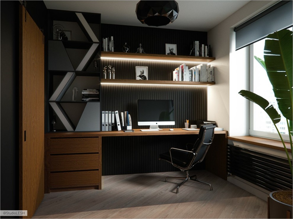Study room - large scandinavian built-in desk laminate floor and brown floor study room idea in Saint Petersburg with beige walls
