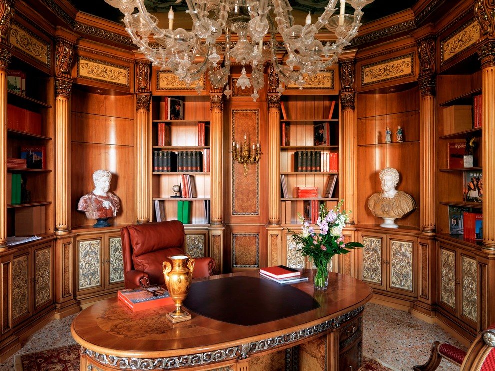 Traditional home office in Venice with a freestanding desk.