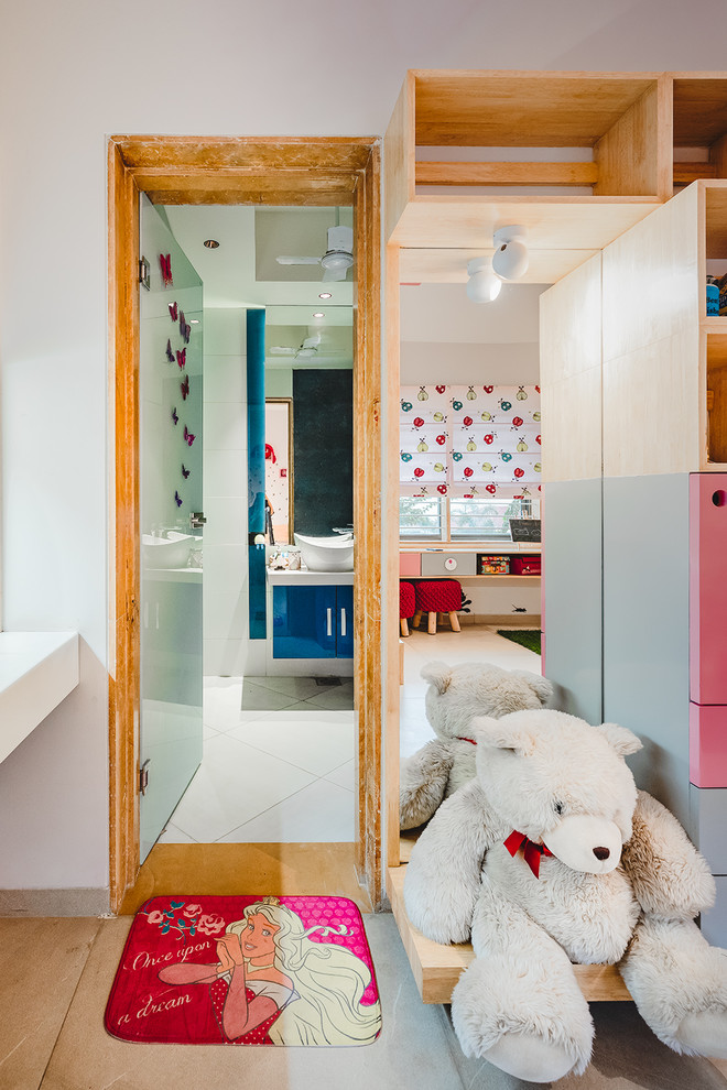 This is an example of a world-inspired kids' bedroom in Ahmedabad.