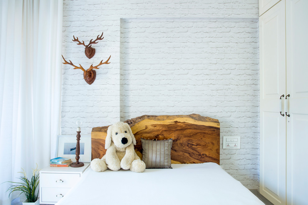 Kids' bedroom - transitional kids' bedroom idea in Mumbai with white walls