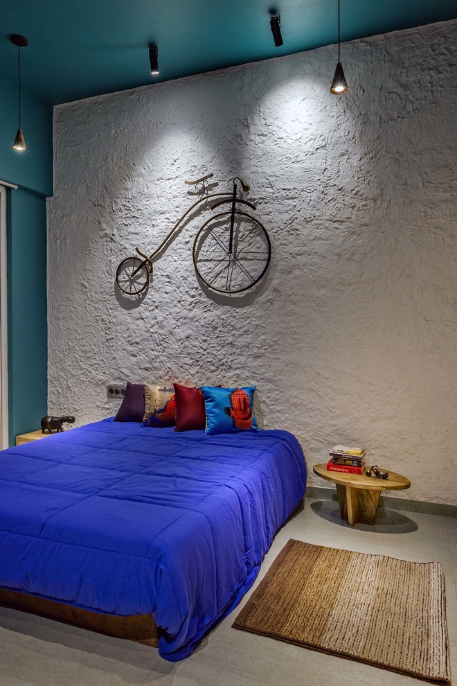 Idéer för att renovera ett mellanstort orientaliskt pojkrum kombinerat med sovrum, med grått golv