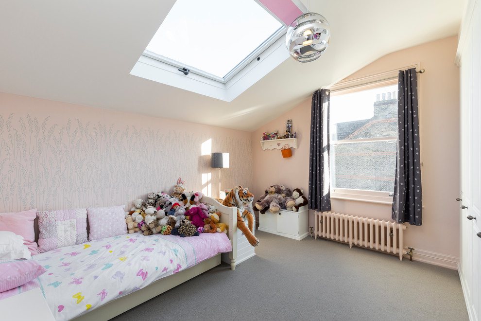 Photo of a contemporary kids' bedroom in London with feature lighting.