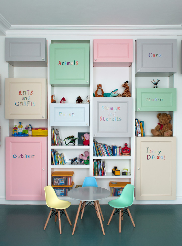 Inspiration for a medium sized country gender neutral playroom in London with white walls and green floors.