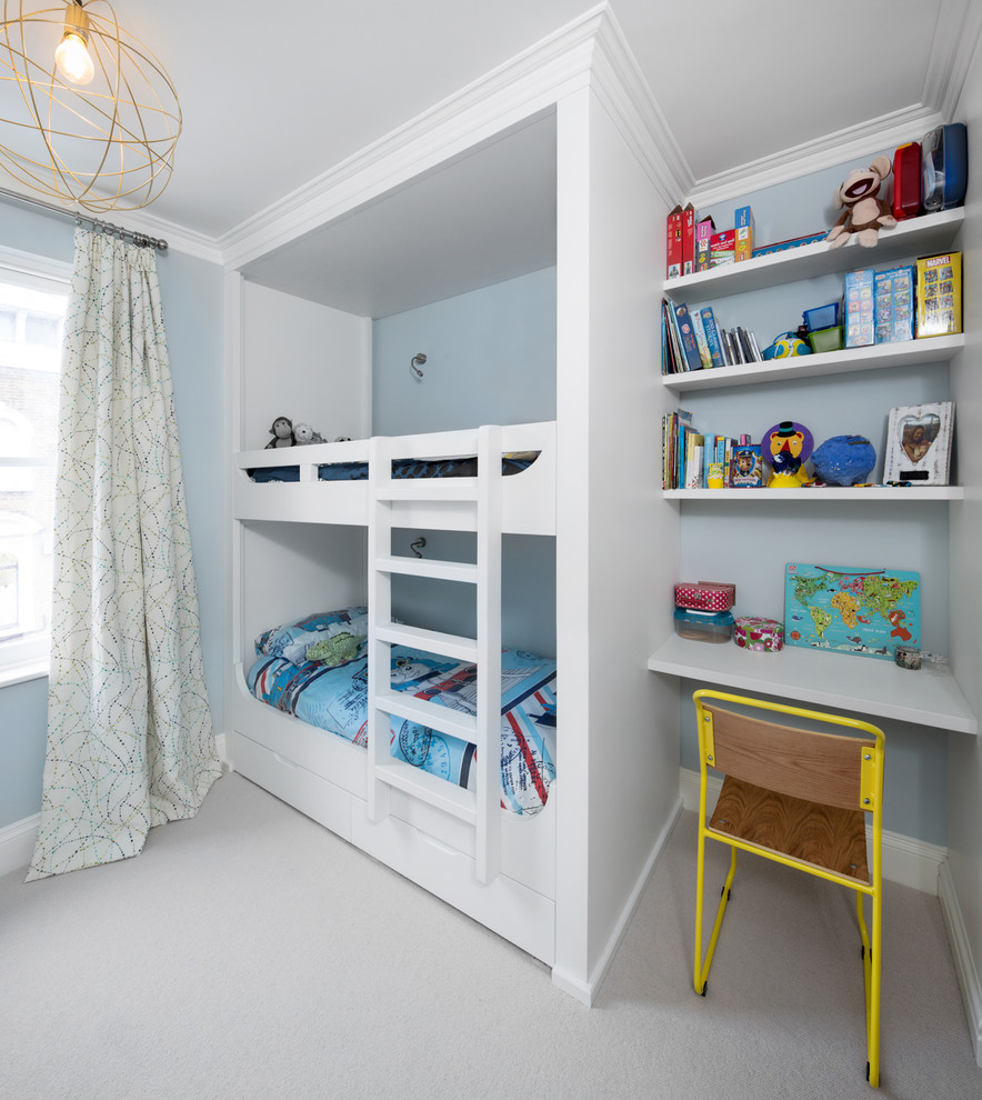 На фото: маленькая детская в стиле неоклассика (современная классика) с синими стенами, ковровым покрытием, бежевым полом и спальным местом для на участке и в саду, мальчика, ребенка от 4 до 10 лет