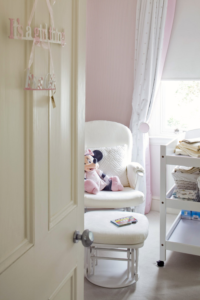 Inspiration for a timeless kids' room remodel in London