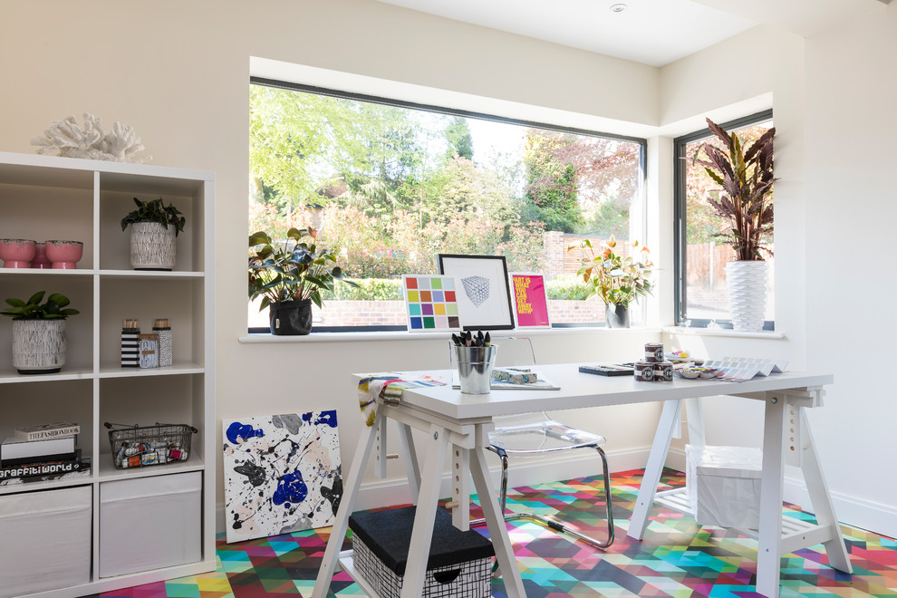 Mid-sized trendy gender-neutral vinyl floor and multicolored floor kids' room photo in Cheshire with white walls