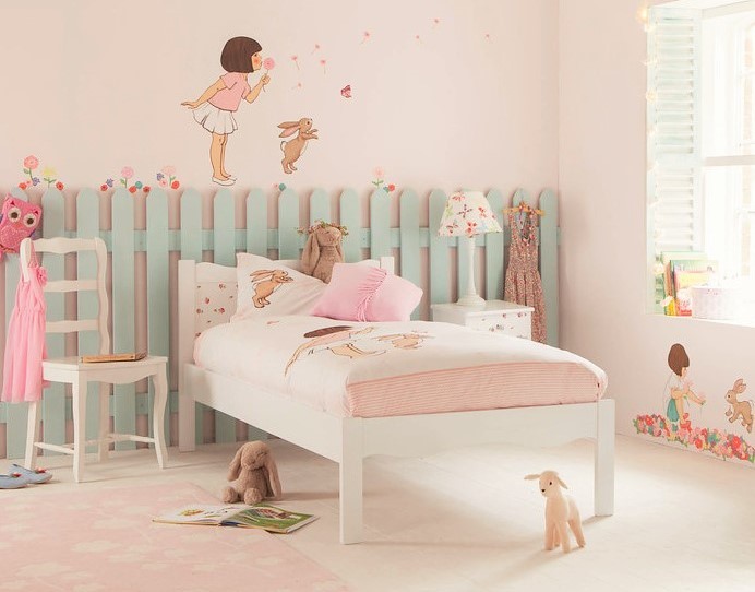Elegant girl kids' room photo in Hampshire with pink walls