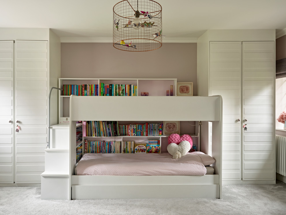 Contemporary kids' bedroom for girls in Buckinghamshire with grey walls, carpet and grey floors.