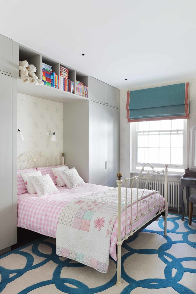 Photo of a contemporary children’s room for girls in London with white walls.
