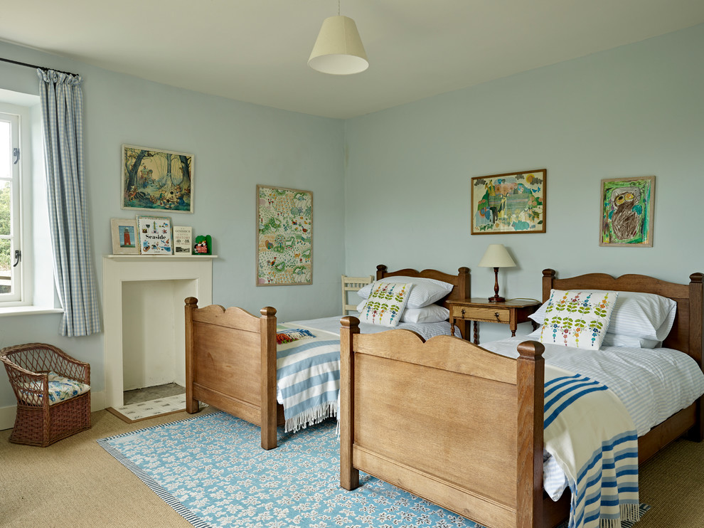 Photo of a medium sized farmhouse gender neutral children’s room in Dorset with blue walls and carpet.