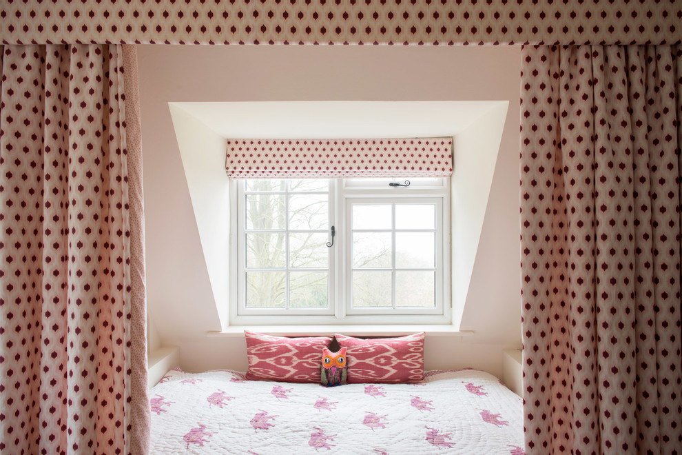 This is an example of a classic children’s room for girls in Gloucestershire with white walls.