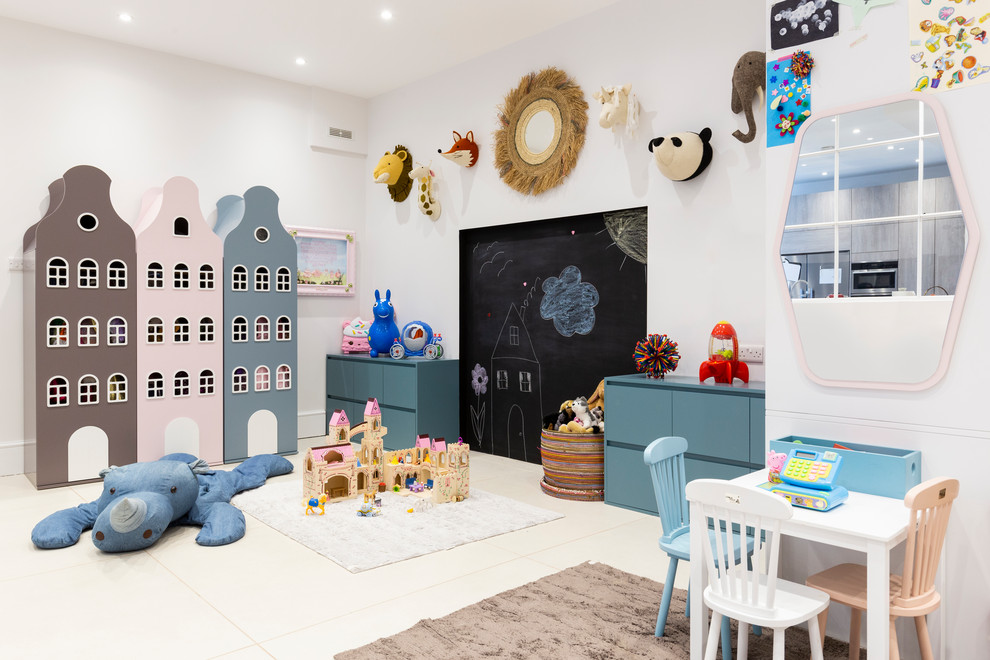 Contemporary gender neutral kids' bedroom in London with white walls and white floors.
